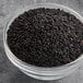 A bowl of Hometown Provisions black sesame seeds.