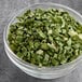 A bowl of chopped dried chives.