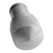 A stainless steel gauge cover knob with a patterned design.