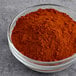 A bowl of Hometown Provisions Fancy Paprika powder.
