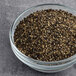 A bowl of Hometown Provisions Coarse Grind black peppercorns.