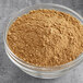 A bowl of brown powder.