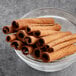 A bowl of Hometown Provisions cinnamon sticks.