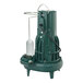 A green Zoeller sewage pump with white accents.