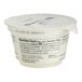 A Chobani Non-Fat Plain Greek Yogurt cup with a label.