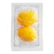 A plastic package with two yellow hard cooked eggs.