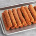 A tray of RollerBites Buffalo Ranch chicken sticks on a plate.