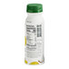 A close up of a white Chobani Greek yogurt drink bottle with a green cap and label.