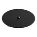 A black disk with a hole in it.