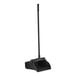 A black dustpan with a long handle.