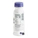 A close-up of a Chobani Low-Fat Mixed Berry Greek Yogurt Drink bottle with a blue cap and label.
