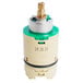 A close-up of a green and gold T&S ceramic cartridge with a white background.