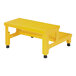 A yellow metal Vestil two-step step stool with black legs.