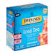 A blue box of Twinings Unsweetened Strawberry and Raspberry Herbal Iced Tea Bags with white and blue text.