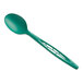 A green Stalk Market compostable spoon with a handle.