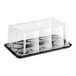 A clear plastic D&W Fine Pack cake display container with a clear scalloped dome lid.