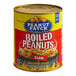 A #10 can of Peanut Patch Cajun Boiled Peanuts on a table in a professional kitchen.