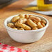 A bowl of Peanut Patch boiled peanuts on a table.