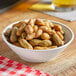 A bowl of Peanut Patch boiled peanuts on a table.