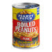 A Peanut Patch can of Cajun Boiled Peanuts on a table in a stadium concession stand.