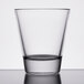 A Libbey Elan rocks glass on a table with a white background.