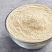 A bowl of Vor Aquafaba Powder on a table.