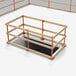 An Ideal Warehouse ProGuard temporary guardrail post kit with metal bars in a metal frame.