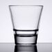 A close up of a Libbey stackable rocks glass with a reflection on it.