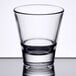 A Libbey clear stackable rocks glass on a table.