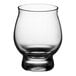 A clear, rounded 8 oz. tasting glass with a wide bowl and sturdy base.