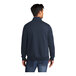 A man wearing a navy Port & Company Core Fleece quarter-zip pullover sweatshirt.