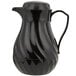 A black plastic Vollrath SwirlServe beverage server with a handle. 