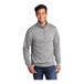 A man wearing a Port & Company athletic heather quarter-zip pullover sweatshirt.