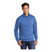 A man wearing a Port & Company heather royal blue quarter-zip pullover.