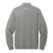 A grey Nike Dri-FIT half-zip sweater with a white swoosh on the front.