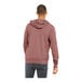 A man wearing a mauve Bella + Canvas full-zip hoodie.
