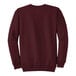 A Port & Company maroon crewneck sweatshirt.