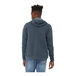 A man wearing a Bella + Canvas heather navy Sponge Fleece hoodie.