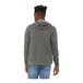 A man wearing a deep heather Bella + Canvas sponge fleece pullover hoodie.