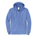 A Port & Company Carolina blue zip up hoodie with a zipper.