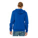 A person wearing a Bella + Canvas blue sponge fleece hoodie.