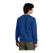 A man wearing a District Deep Royal blue sweatshirt.