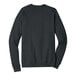 A dark gray Bella + Canvas sweatshirt with black raglan sleeves and a white logo on the back.
