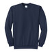 A navy Port & Company core fleece sweatshirt with long sleeves.