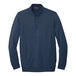 A TravisMathew blue fleece quarter-zip pullover with long sleeves.