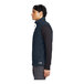 A man wearing a The North Face navy fleece sweater vest.