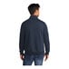 A man wearing a Port & Company navy core fleece quarter-zip pullover sweatshirt.
