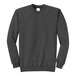 A dark heather grey Port & Company Core Fleece sweatshirt with long sleeves.