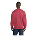 A man wearing a heather red Port & Company core fleece sweatshirt.