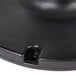 A black round plastic umbrella base with a hole in it.